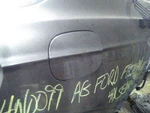 17 Ford Fusion Fuel Filler Door Used. Price: $78.00.