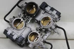 Aprilia Tuono V4 1100 21+ Oem Front Rear Throttle Bodies Body Intake Tps Used. Price: $144.99.
