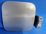 2002 Honda Civic Fuel Filler Door Silver Used. Price: $30.00.