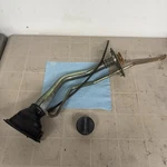 Oem Fuel Filler Neck Assembly W/ Cap & Grommet Toyota JZX90 Mark Ii Jdm Used. Price: $250.00.
