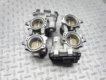 2014 Aprilia Tuono 1000 Front Rear Throttle Body Bodies Valve Housing Bare Racks Used. Price: $87.35.