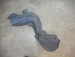 2007 Nissan Armada Fuel Filler Neck Cover 76766-7S000 Used. Price: $26.50.