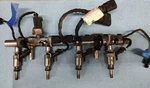 Oe Volkswagen '14 Passat 1.8TURBO Fuel Injectors Rail & Harness Assy #06K133317H Used. Price: $124.95.