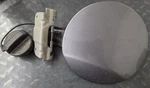 Gas Tank Lid Nissan Versa Note 13-19 Brilliant Silver Paint Code K23 Used. Price: $20.00.