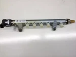 Genuine Volkswagen Fuel Rail 03L-130-089 New. Price: $752.84.